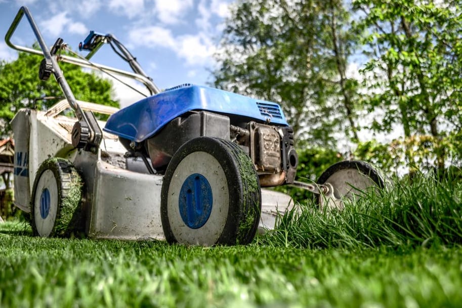 Ciwuki gardener trimming hedges at a residential property